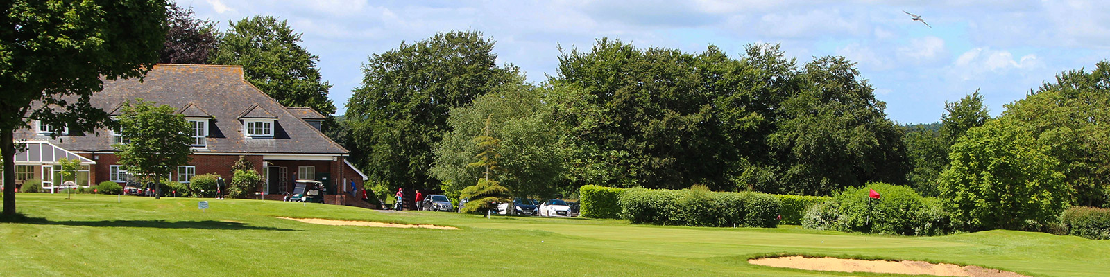 view of golf course and clubhouse